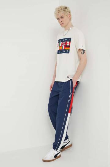 Спортивные штаны Tommy Jeans Archive Games цвет синий с узором DM0DM19539 Спортивные штаны Tommy Jeans Archive Games цвет синий с узором DM0DM19539