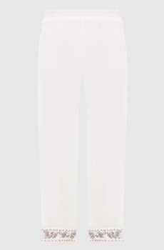 Белые брюки с аппликацией