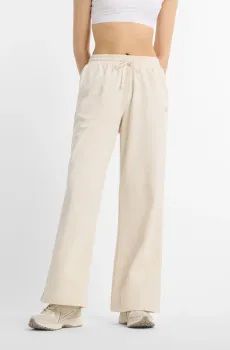 Женские бежевые спортивные брюки Coastal Fleece Белый XL New Balance WP51503LIN