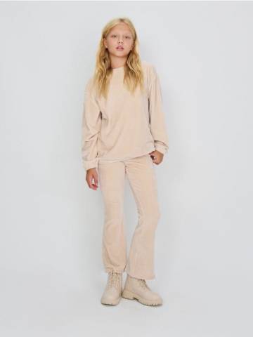 Розкльошені штани - бежевий