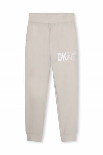 Детские хлопковые штаны Dkny цвет белый с принтом Детские хлопковые штаны Dkny цвет белый с принтом