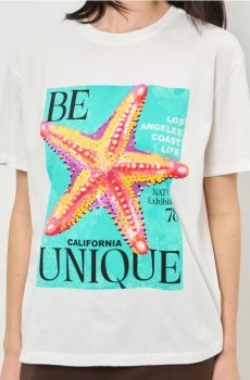 Бавовняна oversize футболка з принтом - кремовий