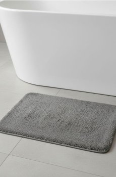 Одноколірний килимок для ванної - сірий