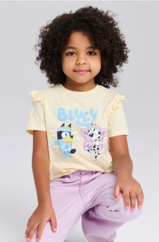 Бавовняна футболка з принтом Bluey - світло-жовтий