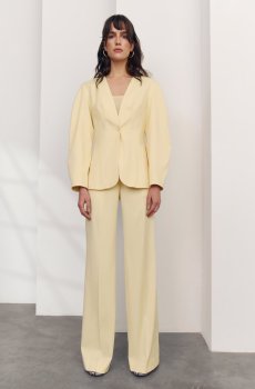 Жовті штани-палаццо із високою талією