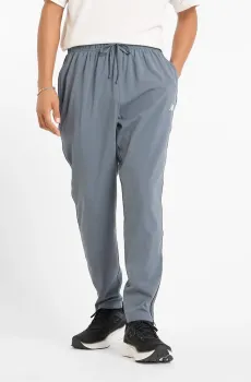 Мужские серые спортивные брюки Sport Woven Серый XL New Balance MP51904GT