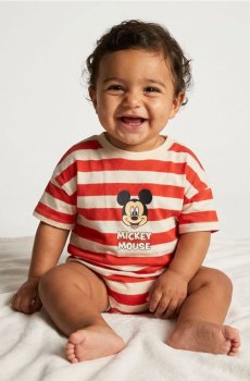 Бавовняне боді з принтом Mickey Mouse - кремовий