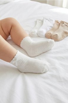 Набір антиковзних шкарпеток із хвилястим манжетом і бантиком 5 шт. - пастельний рожевий