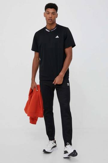 Спортивные штаны adidas Originals цвет чёрный с аппликацией Спортивные штаны adidas Originals цвет чёрный с аппликацией