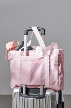 Дорожня сумка з кишенями - рожевий