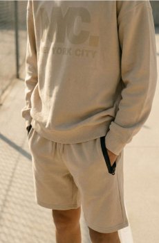 Шорти з кишенями на блискавці - бежевий