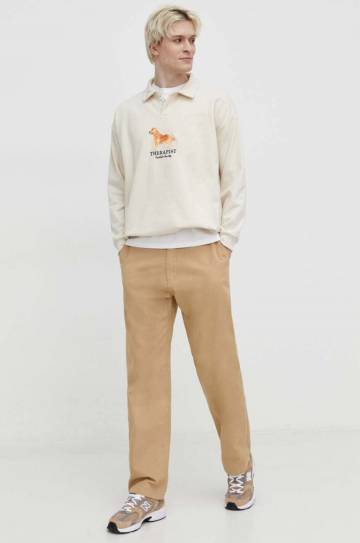 Хлопковые брюки Quiksilver цвет бежевый прямое Хлопковые брюки Quiksilver цвет бежевый прямое