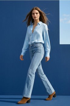 Розкльошені джинси із середньою талією - синій