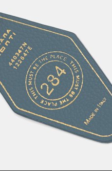 Кожаный брелок Liviana Conti