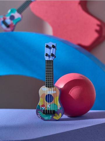 Музична іграшка гітара ukulele - помаранчевий Музична іграшка гітара ukulele - помаранчевий