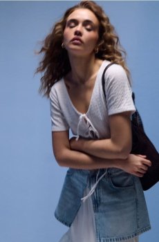 Елегантна блуза з декоративними завязками - білий