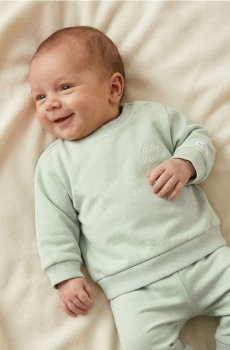 Бавовняний світшот з написом на спині - блідо-зелений