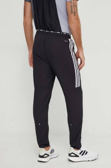 Штаны для бега adidas Performance Own the Run цвет чёрный с принтом Штаны для бега adidas Performance Own the Run цвет чёрный с принтом