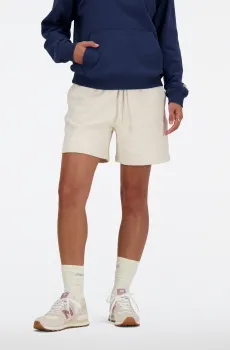 Женские бежевые шорты NB Athletics Бежевый XL New Balance WS41508LIN