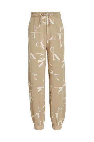 Детские хлопковые штаны Calvin Klein Jeans TERRY JOGGER цвет бежевый с узором IB0IB02124 Детские хлопковые штаны Calvin Klein Jeans TERRY JOGGER цвет бежевый с узором IB0IB02124