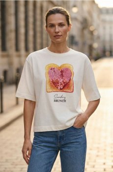 Бавовняна футболка з принтом - кремовий