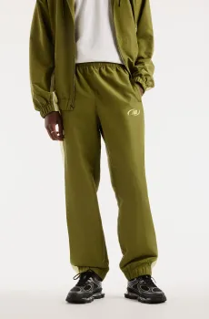 Мужские зеленые спортивные брюки Trackside Woven Зеленый L New Balance MB62A8LTGEE