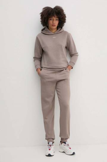 Спортивные штаны Calvin Klein цвет бежевый однотонные K20K208330 Спортивные штаны Calvin Klein цвет бежевый однотонные K20K208330