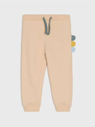 Трикотажні штани - бежевий