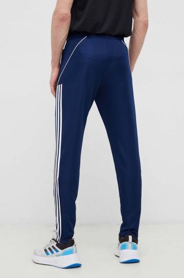 Тренировочные брюки adidas Performance Tiro 23 цвет синий с аппликацией Тренировочные брюки adidas Performance Tiro 23 цвет синий с аппликацией