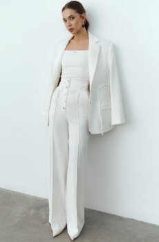 Молочні штани з акцентними кнопками