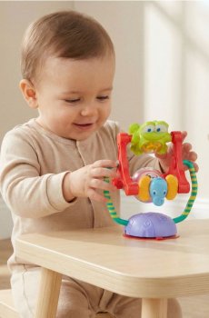 Іграшка - Обертається карусель з присоскою - різнобарвний