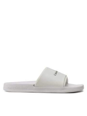 Calvin Klein Jeans Шльопанці Slide Monogram Tpu YM0YM00361 Білий Calvin Klein Jeans Шльопанці Slide Monogram Tpu YM0YM00361 Білий