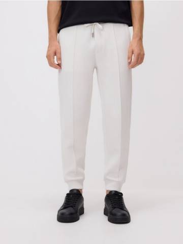 Reserved - Трикотажні штани slim - кремовий - 6688L-01X