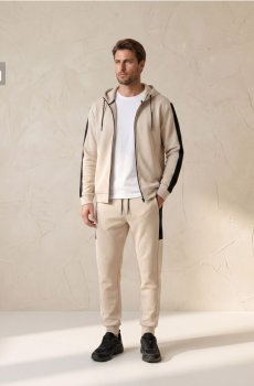 Спортивні штани jogger з контрастними вставками та кишенями на блискавці - нюдовий
