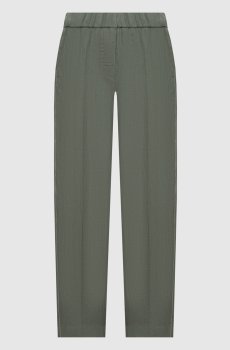 Зеленые брюки из льна