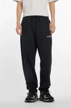Мужские черные спортивные брюки Linear Graphic Fleece Pant Черный XL New Balance MP53508BK