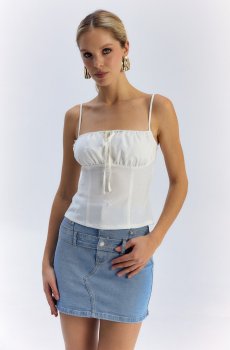 Молочний кроп-топ з бантами