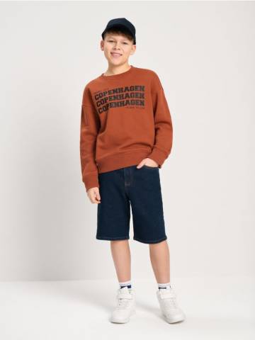 Джинсові шорти з потертостями - темно-синій