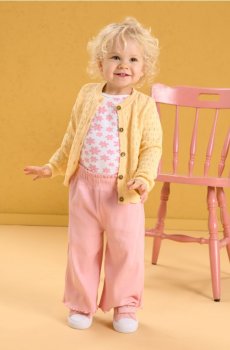 Ажурний светр із ґудзиками під дерево - світло-жовтий