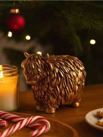 Святкова стояча прикраса у формі яка - золотий