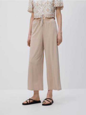 Reserved - Широкі штани з модалом - бежевий - YU025-08X
