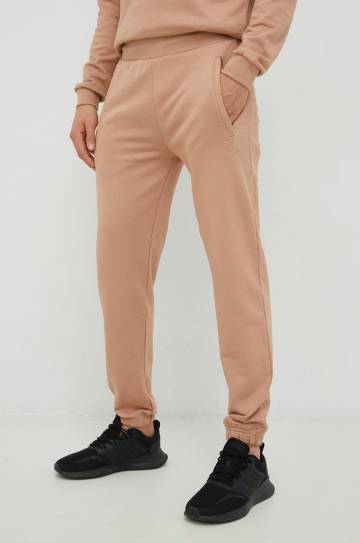 Хлопковые спортивные штаны Arkk Copenhagen unisex цвет бежевый однотонные Хлопковые спортивные штаны Arkk Copenhagen unisex цвет бежевый однотонные
