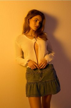 Джинсова мініспідниця з воланом - синій