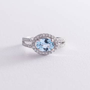 Серебряное помолвочное кольцо с голубым топазом и фианитами 111457 Серебряное помолвочное кольцо с голубым топазом и фианитами 111457