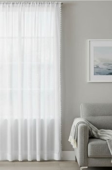 Однотонна штора на люверсах з помпонами - білий