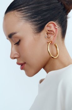 Золотисті сережки металік заокругленої форми