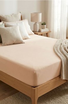 Бавовняне трикотажне простирадло з еластичною гумкою - бежевий