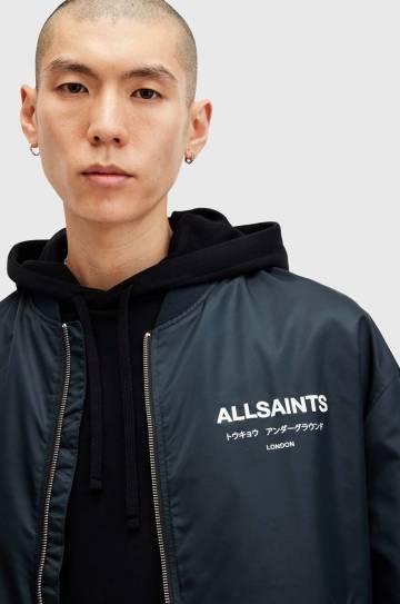 Куртка-бомбер AllSaints UNDERGROUND мужской цвет синий переходная M024OA Куртка-бомбер AllSaints UNDERGROUND мужской цвет синий переходная M024OA