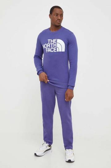 Хлопковые спортивные штаны The North Face цвет фиолетовый однотонные Хлопковые спортивные штаны The North Face цвет фиолетовый однотонные