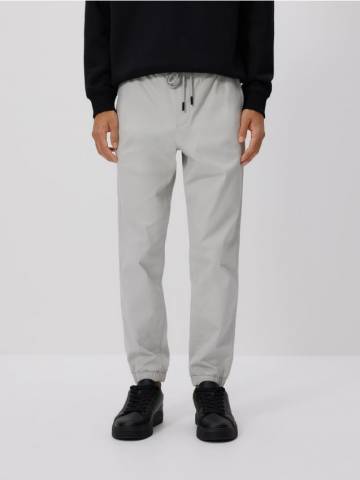 Reserved - Бавовняні джоггери - світло-сірий - 6006L-09X